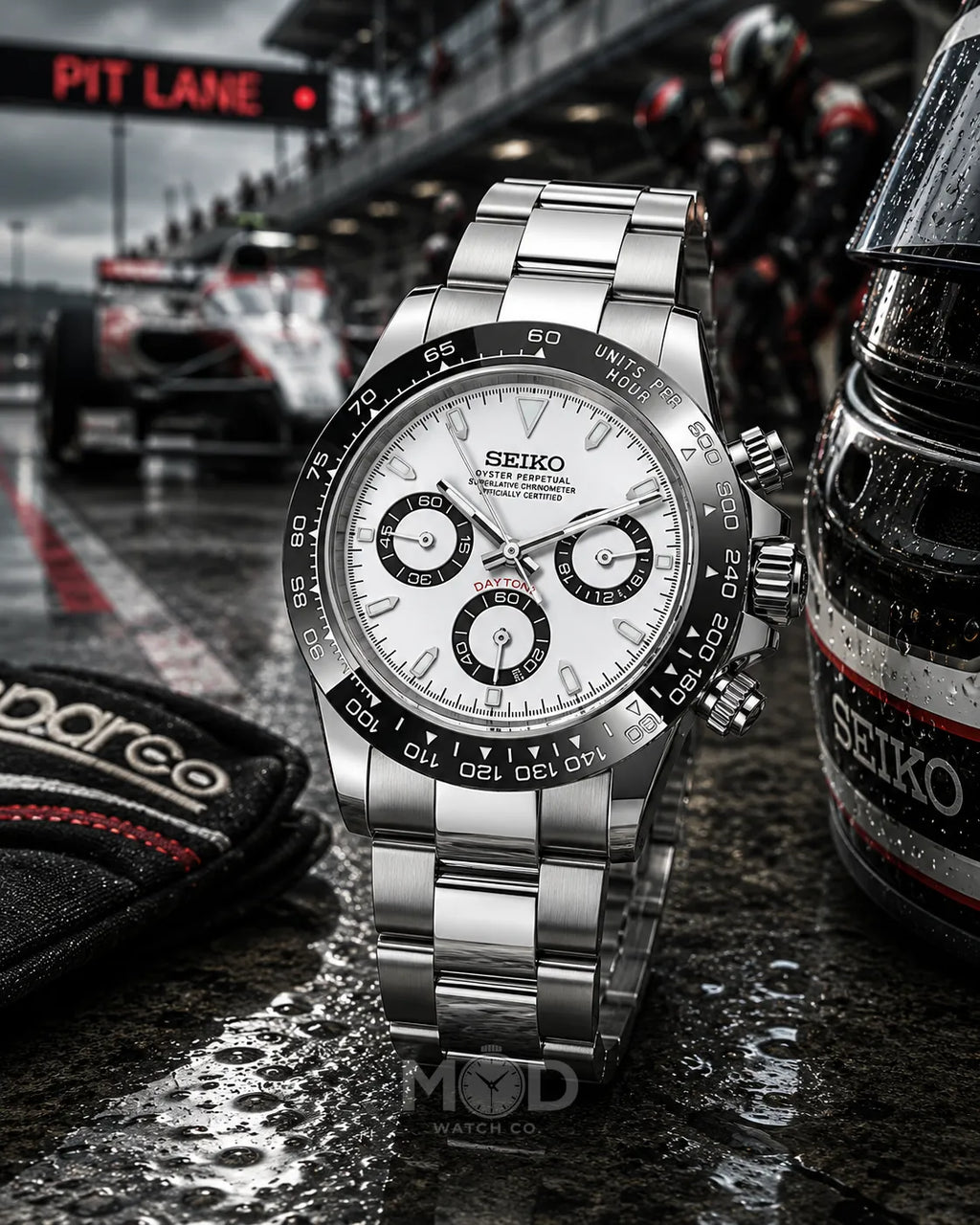 Seiko watch with racing theme, including a race car and 'Pit Lane' sign.