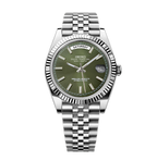 Silver watch with a green face on a white background
