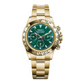 Gold Seiko watch with a green face on a white background