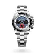 Seiko watch with a silver strap and black dial on a white background