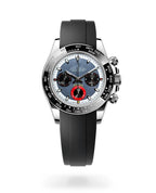 Watch with black strap and silver case on a white background