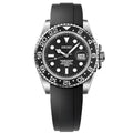 Seiko watch with black dial and rubber strap on a white background