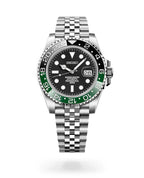 Seiko watch with black face, green bezel, and silver metal bracelet on a white background