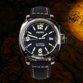 Seiko watch with black face and leather strap on a dark background