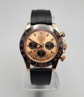 Seiko watch with black and rose gold design on a gray background
