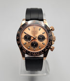 Seiko watch with black and rose gold design on a gray background