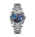 Silver Seiko watch with blue face on a white background