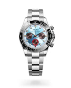 Luxury watch with a silver metal strap and blue face on a white background