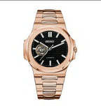Rose gold Seiko watch with black dial on a white background
